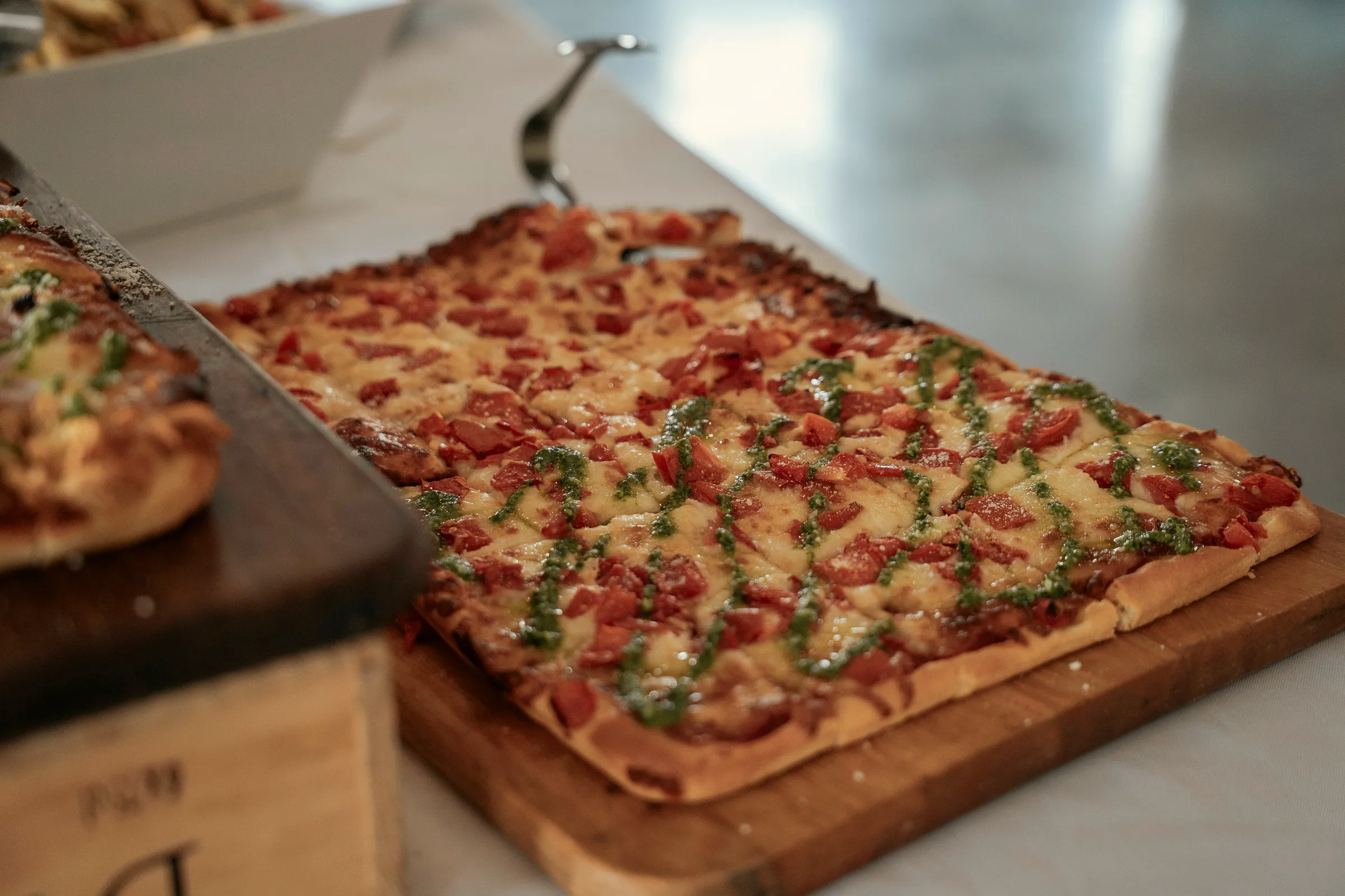 Baldwins Creek Farm - Hopewell Township, NJ: catered tomato mozzarella flatbread with pesto drizzle