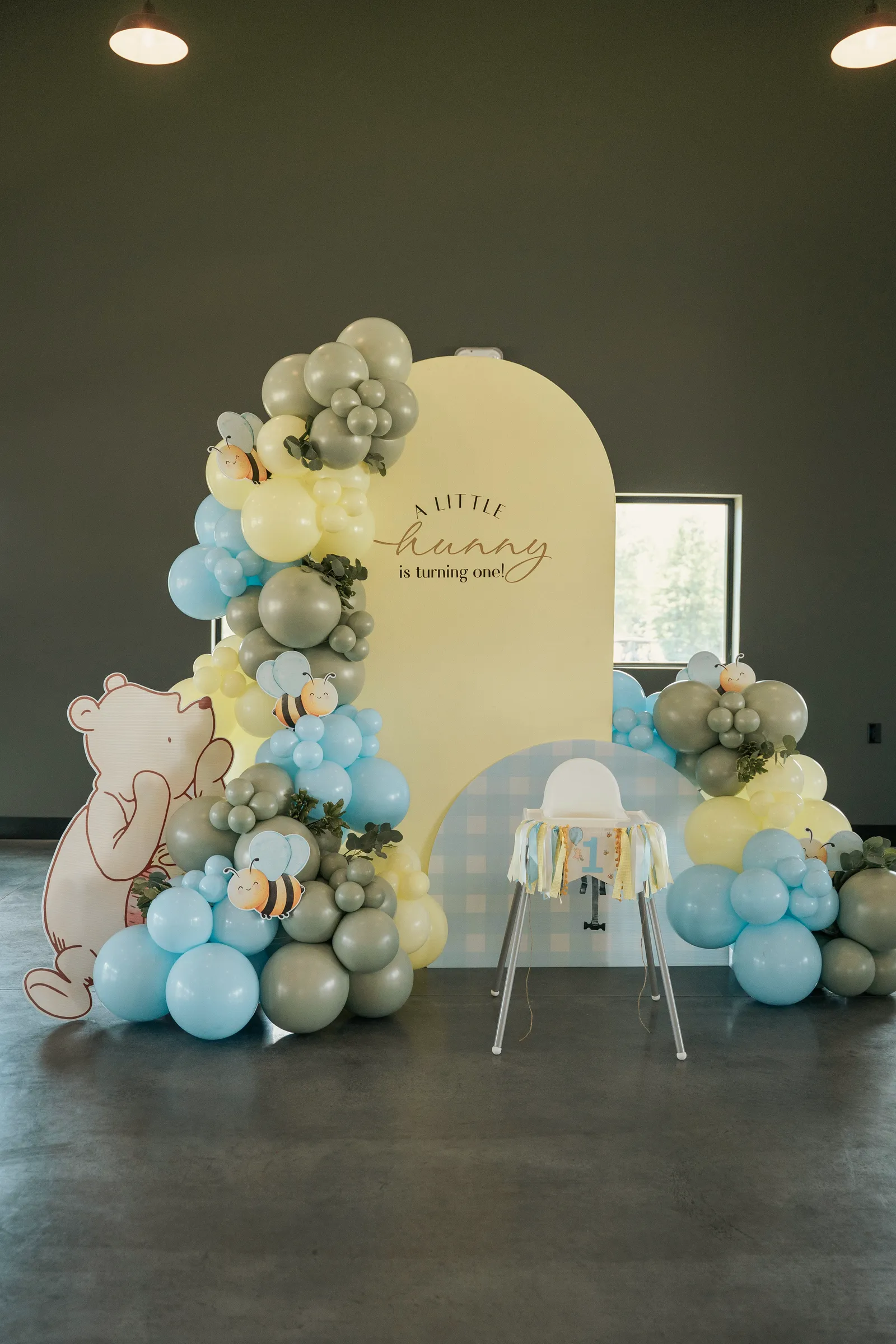 Baldwins Creek Farm - Hopewell Township, NJ: first birthday balloon garland and arch backdrop with a honey bee theme and high chair